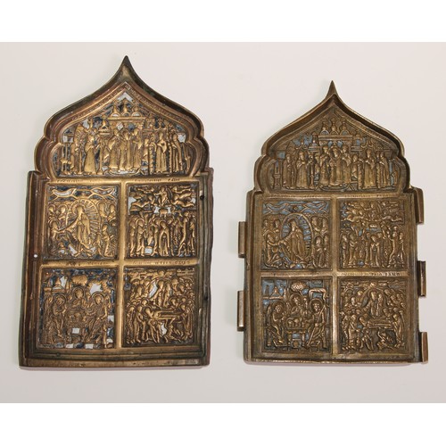 444 - A Russian Orthodox brass triptych icon, in relief with scenes from the life of St Nicholas of Mozhai... 