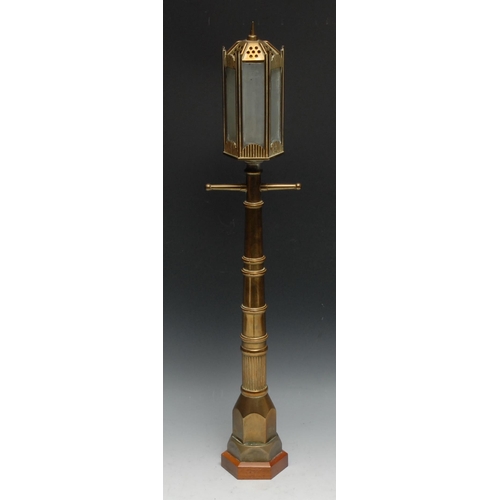 278 - A brass novelty table lamp, modelled as a street lamp, 59cm high