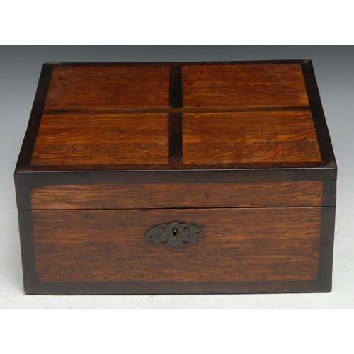 196 - A Victorian oak and mahogany collectors box, the hinged cover enclosing a nine compartmental removab... 