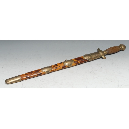 737 - A Chinese jian sword, 42.5cm blade, fluted wooden grip, tortoiseshell scabbard, chased brass mounts,... 