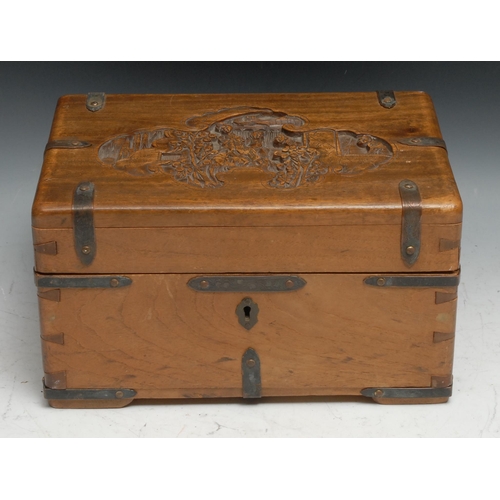 119 - A Chinese camphor wood rounded rectangular box, mounted to the angles in the campaign manner, hinged... 