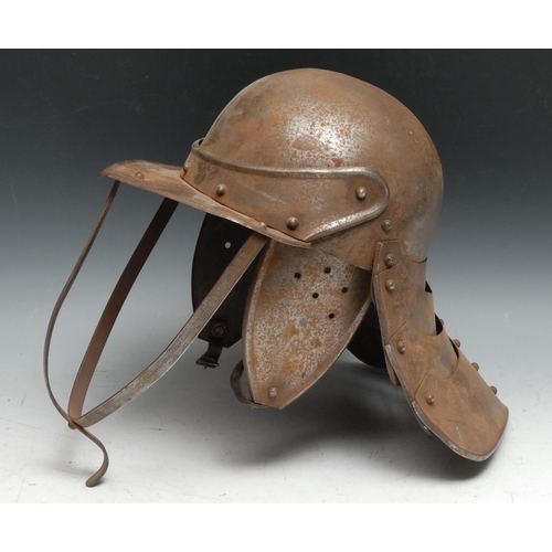 544 - An English Civil War style Parliamentarian steel lobster tailed pot helmet, 33cm high