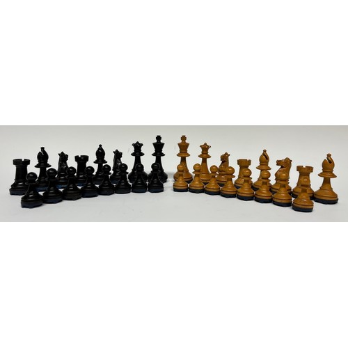 175 - A boxwood and ebonised Staunton pattern chess set, fitted with weighted magnetic bases, the Kings 7c... 