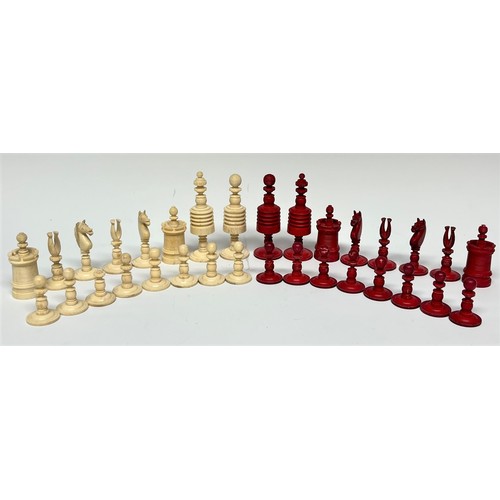 8 - A 19th century bone barley corn pattern chess set, red stained opposition, the king's 9cm high