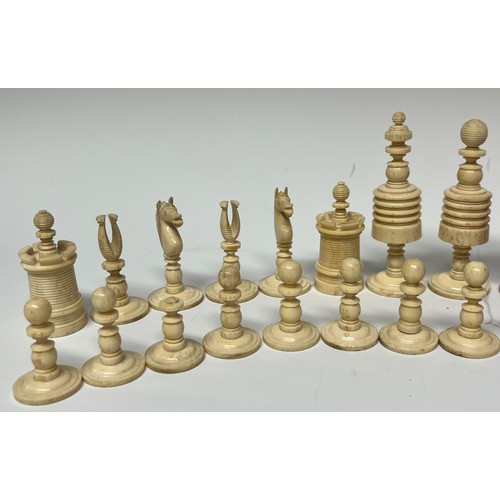 8 - A 19th century bone barley corn pattern chess set, red stained opposition, the king's 9cm high