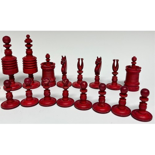 8 - A 19th century bone barley corn pattern chess set, red stained opposition, the king's 9cm high