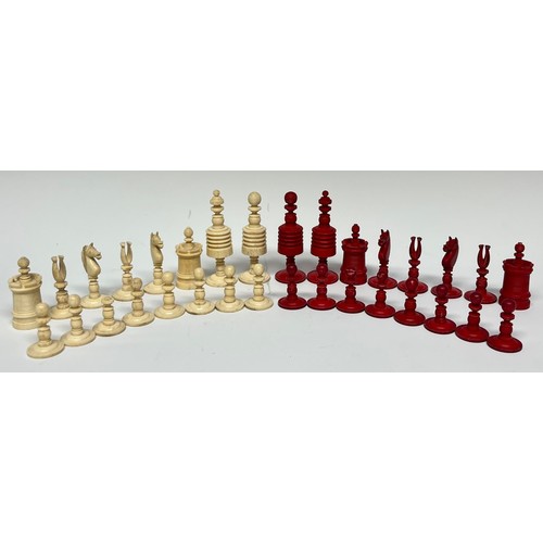 8 - A 19th century bone barley corn pattern chess set, red stained opposition, the king's 9cm high