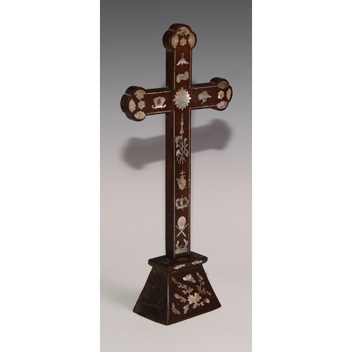 290 - A Chinese hardwood and mother of pearl cross,  inlaid with foliage and symbols, 30.5cm high