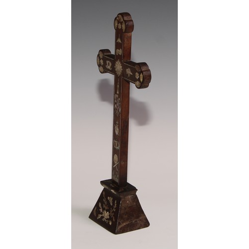 290 - A Chinese hardwood and mother of pearl cross,  inlaid with foliage and symbols, 30.5cm high