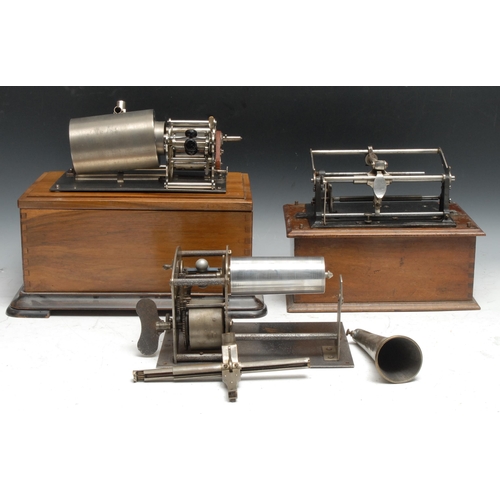 788 - An early 20th century cylinder phonograph, walnut case;  another Pathe Feres, part;  etc (3)