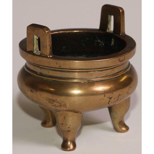 68 - A Chinese bronze ding tripod censer, angular lug handles, 8.5cm wide