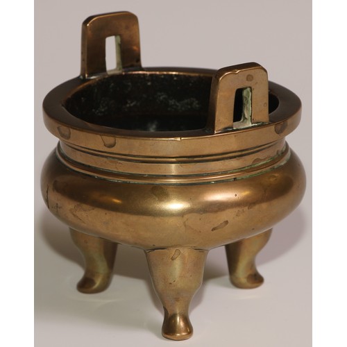 68 - A Chinese bronze ding tripod censer, angular lug handles, 8.5cm wide