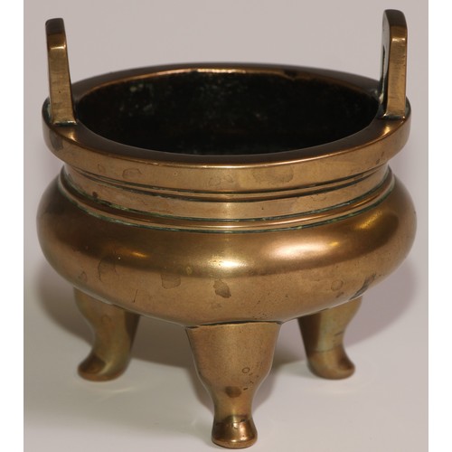 68 - A Chinese bronze ding tripod censer, angular lug handles, 8.5cm wide