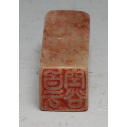 304 - A Chinese soapstone seal, inscribed to two faces with verse, 5.5cm highl others (5)