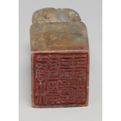 304 - A Chinese soapstone seal, inscribed to two faces with verse, 5.5cm highl others (5)