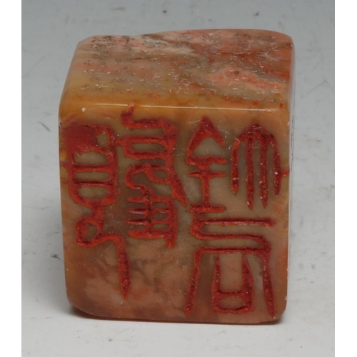 304 - A Chinese soapstone seal, inscribed to two faces with verse, 5.5cm highl others (5)