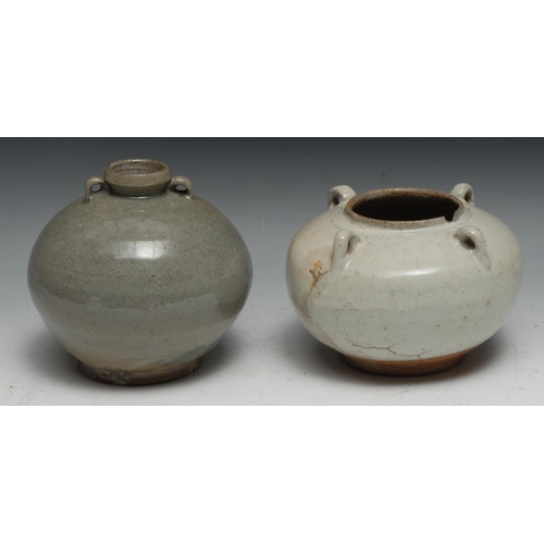 121 - A Chinese celadon wine jar, of Archaic form, four lug handles, 16cm diam; another (2)