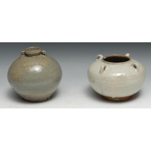 121 - A Chinese celadon wine jar, of Archaic form, four lug handles, 16cm diam; another (2)