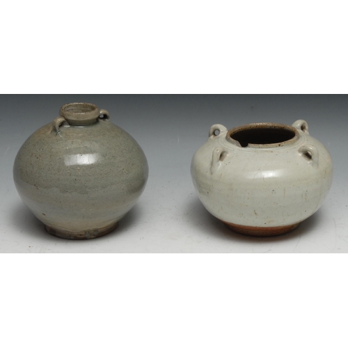 121 - A Chinese celadon wine jar, of Archaic form, four lug handles, 16cm diam; another (2)