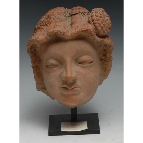 841 - Antiquities - an Aknoor terracotta head, 15cm high, Kashmir, c.5th/6th century, mounted for display,... 