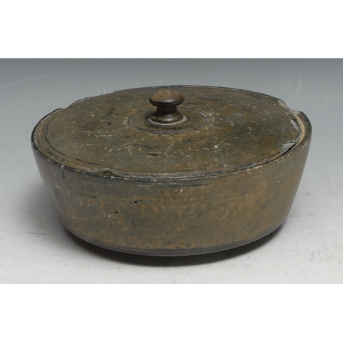 828 - Antiquities - a Gandharan green schist circular box and cover, 19cm diam