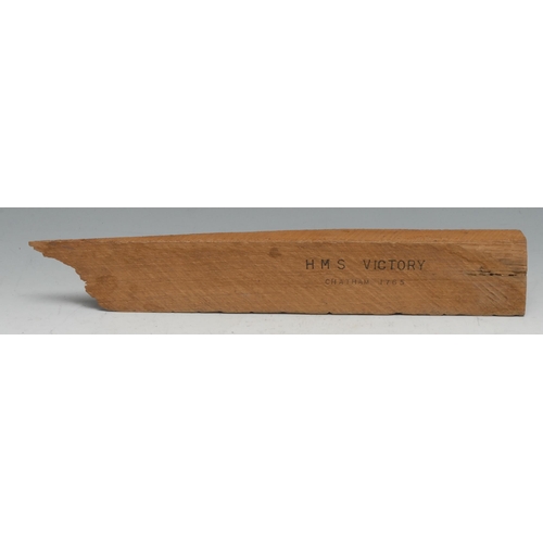 241 - The Cult of Nelson - a splinter of salvaged oak, stamped HMS Victory, Chatham 1765, 34.5cm long