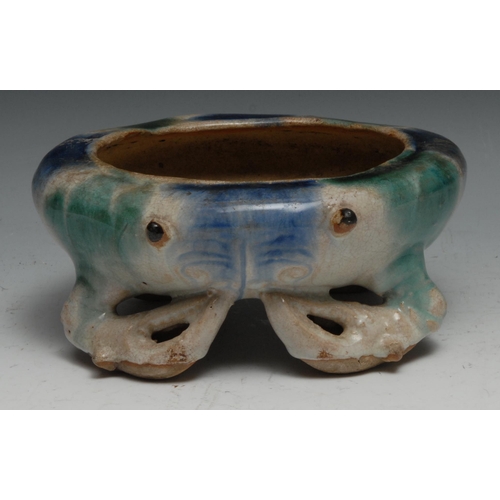 300 - A Chinese Shiwan bowl, as a crab, glazed in mottled tones of blue and green, 20cm wide, 19th century