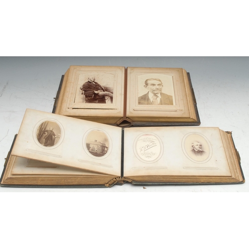 957 - Photography - a 19th century tooled leather carte de visite album, containing various single and gro... 