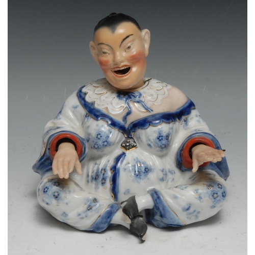 1 - A German porcelain nodding pagoda figure, modelled as a Chinese lady, seated cross-legged, 14cm high... 