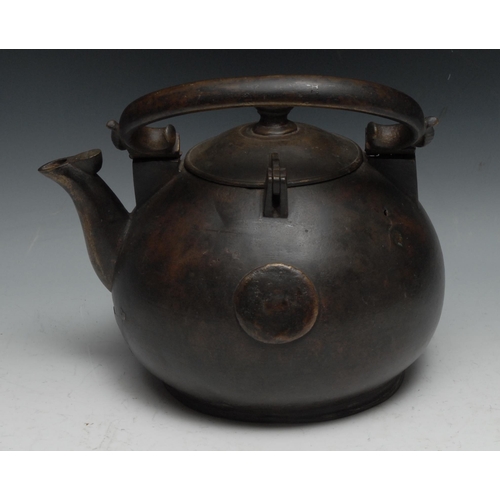 129 - A Japanese bronze kettle, 24.5cm over raised handle, 19th century