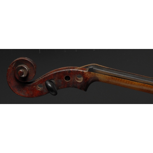 209 - A violin, the two-piece back 35.5cm long excluding button, Compagnon label, ebony tuning pegs, outli... 