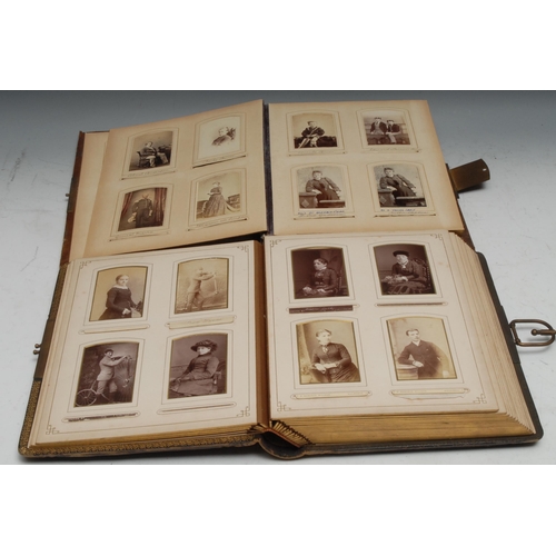 960 - Photography - a late 19th century tooled leather carte de visite album, containing mostly single por... 