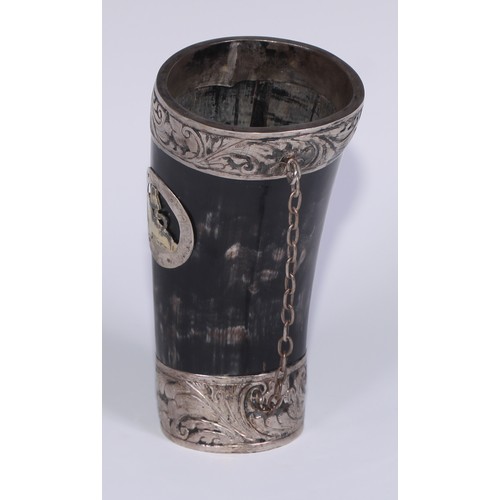 464 - A South American silver mounted horn mate beaker and straw, the fittings chased with scrolling leave... 