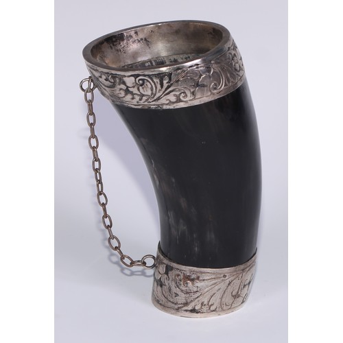 464 - A South American silver mounted horn mate beaker and straw, the fittings chased with scrolling leave... 