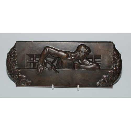 24 - Maurice Constant Favre (Bn.1875), after, a brown patinated bronze plaque, The Escape, 25cm wide