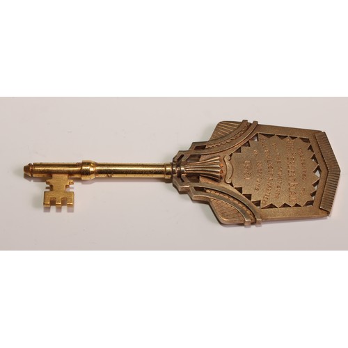 87 - Copoclephily - an Art Deco gilt metal presentation key, The Avon India Rubber Co Ltd New Head Office... 