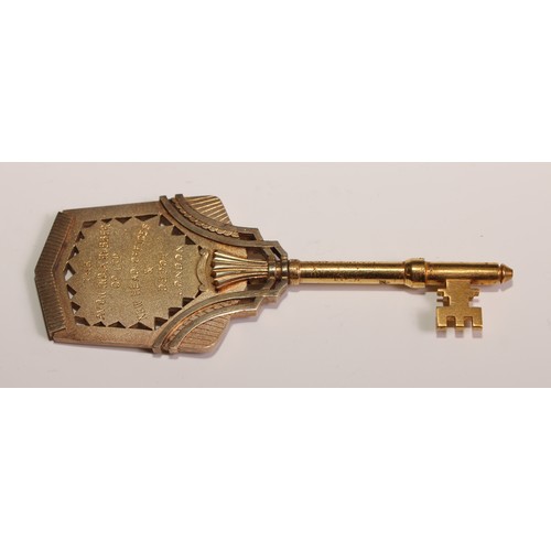 87 - Copoclephily - an Art Deco gilt metal presentation key, The Avon India Rubber Co Ltd New Head Office... 