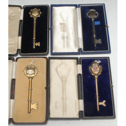 76 - Copoclephily - a George V silver-gilt and enamel presentation key, Widnes Queens Nurses Association,... 