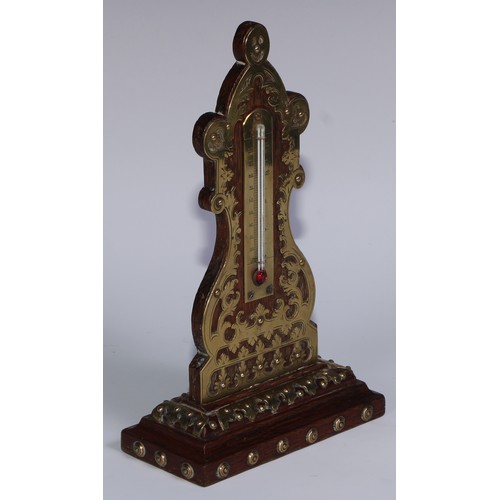 162 - A 19th century oak desk thermometer, applied overall with brass cut-card work, 22.5cm high, c.1870