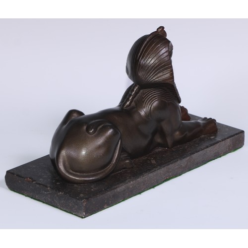 114 - A 19th century library model, cast as a sphinx, rectangular marble base, 28cm long