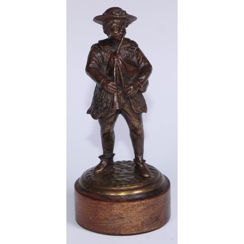 312 - A Continental brown patinated cabinet bronze, of an Alpine bagpiper, 17cm high