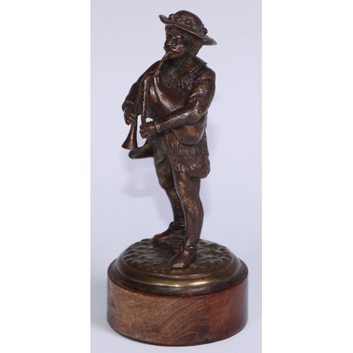 312 - A Continental brown patinated cabinet bronze, of an Alpine bagpiper, 17cm high