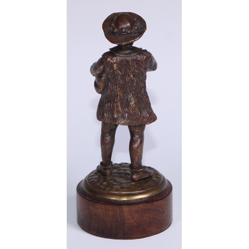 312 - A Continental brown patinated cabinet bronze, of an Alpine bagpiper, 17cm high