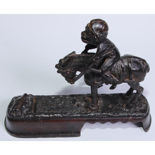 6 - A 19th century American cast iron novelty mechanical bank money box, as a jockey thrown  from his mo... 