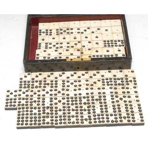 451 - A set of 19th century bone and ebony double nine  dominoes, associated tooled morocco leather box, 2... 