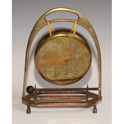 476 - A Victorian brass and copper novelty table top dinner gong, of equestrian interest, as an oversize s... 