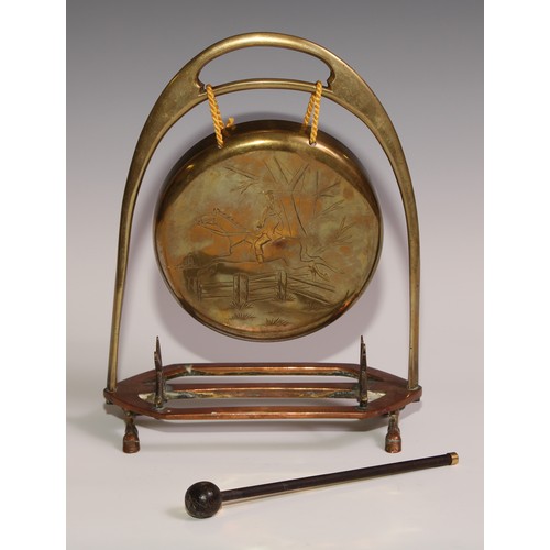 476 - A Victorian brass and copper novelty table top dinner gong, of equestrian interest, as an oversize s... 