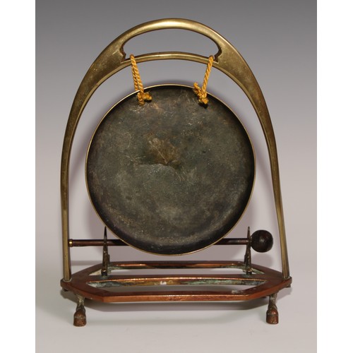 476 - A Victorian brass and copper novelty table top dinner gong, of equestrian interest, as an oversize s... 