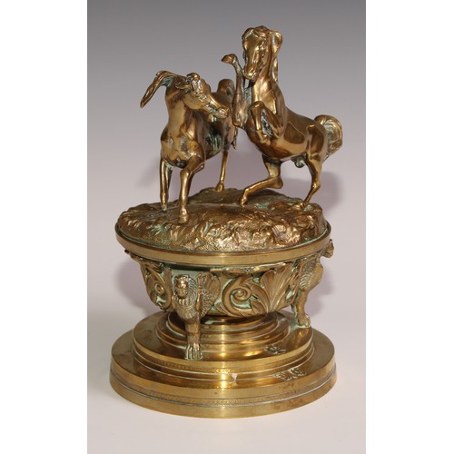 469 - A substantial sculptural 19th century French bronze inkwell, the cover cast with a pair horses power... 