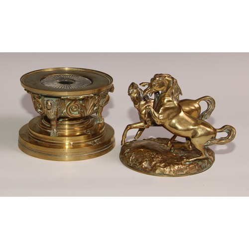 469 - A substantial sculptural 19th century French bronze inkwell, the cover cast with a pair horses power... 